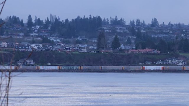 long freight trane rolling along