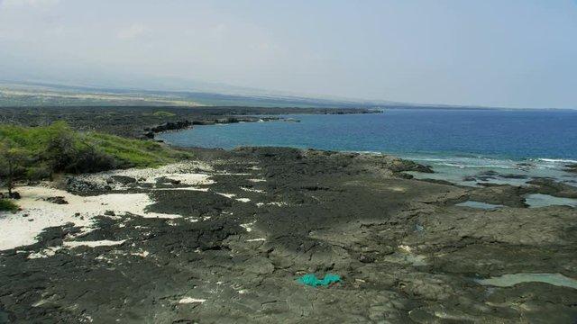 Aerial coastline view lava spills Big Island Hawaii