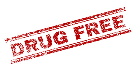 DRUG FREE seal print with grunge texture. Red vector rubber print of DRUG FREE text with dust texture. Text tag is placed between double parallel lines.