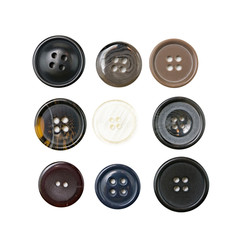 Multi-colored plastic sewing buttons on isolated background 