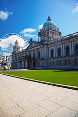 Fototapeta na wymiar Belfast City Hall and Ferris wheel