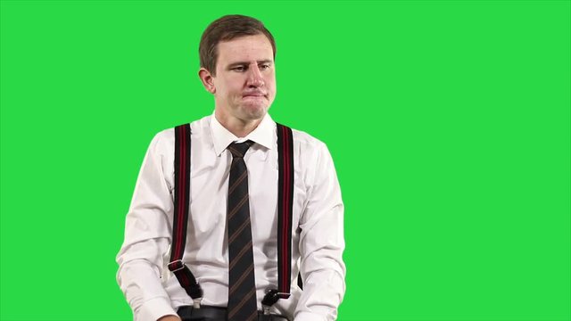Portrait of modern young business man on green screen. 