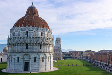 Fototapeta na wymiar Panoramic view of Piazza dei Miracoli (Square of Miracles) with baptistery, cathedral and leanint tower from Pisa city wall, Pisa, Tuscany, Italy