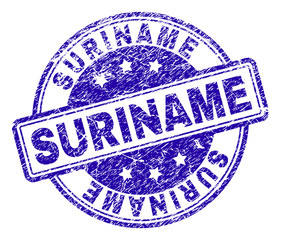 SURINAME stamp seal watermark with grunge texture. Designed with rounded rectangles and circles. Blue vector rubber print of SURINAME title with dirty texture.