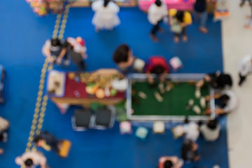 blur photo - people is feeding rabbits