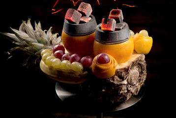 Shisha hookah with red hot coals. Sparks from breathe. Modern hookah with coconut charcoal for relax and shisha smoke. Hookah and sparks from coals. coal, hot, shisha, spark, hookah sparks