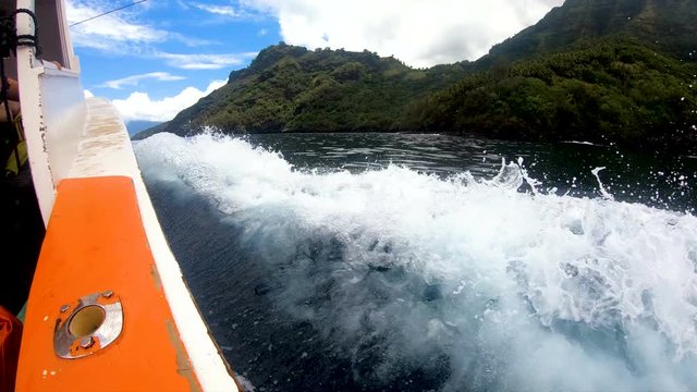 Boat fishing near Tahuata Marquesas Island South Pacific 