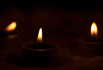 World Religion Dayconcept：Many burning candles with shallow depth of field