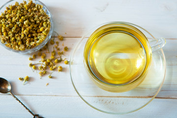chamomile tea on white background