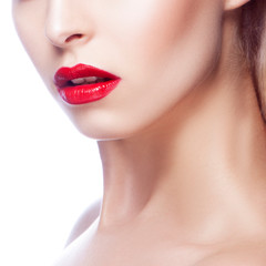 Part of girl face with bright red lips, clean skin. White background