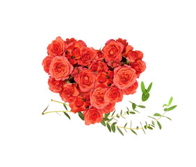Red rose flowers in a heart shape arrangement with eucalyptus leaves
