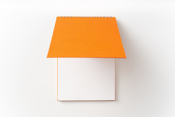 spiral orange notebook with open cover