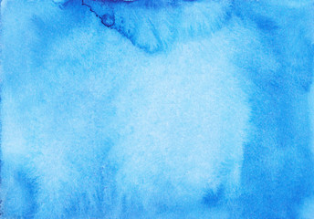 Bright blue watercolor background texture. Blue aquarelle stains on paper. Watercolor hand painting cold backdrop. Abstract art. Light blue watery background. Sky blue template for cards, invitations.