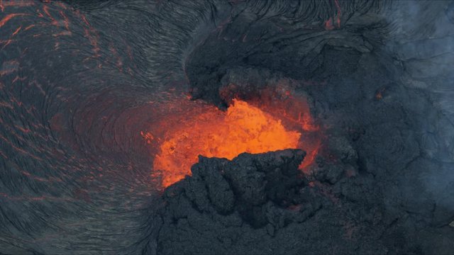 Aerial view hot lava rock forming on landing