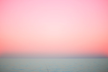 Beautiful sea, pink sunset, nature, summer. The concept of fashion colors