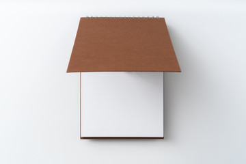 spiral brown notebook with open cover