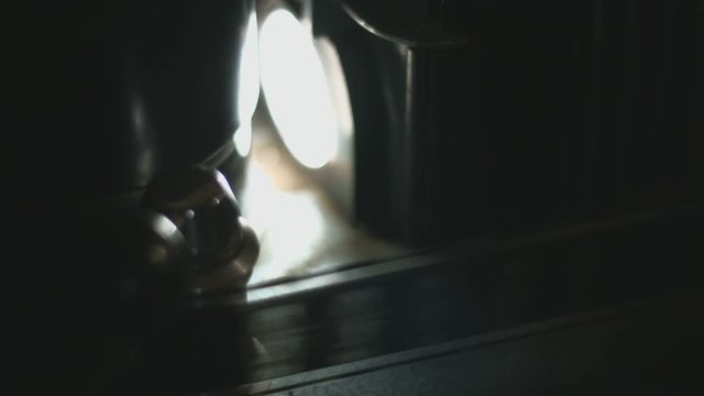 Film rolling in old film editing equipment start and stop