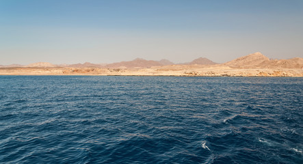 Fototapeta premium Sinai mountains and picturesque landscapes of the red sea in Egypt. Boat trip on the red sea