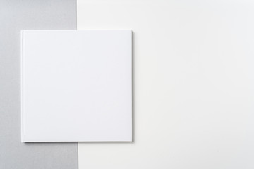 Top view of white hardcover notebook