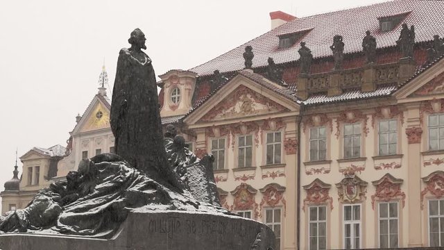 Jan Hus Memorial at winter snowfall, Old Town Square in Prague