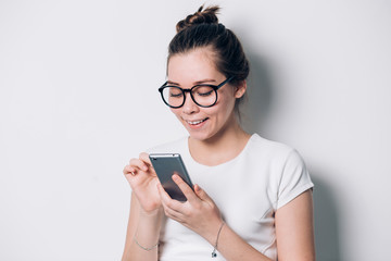 Image of young female using cellular phone