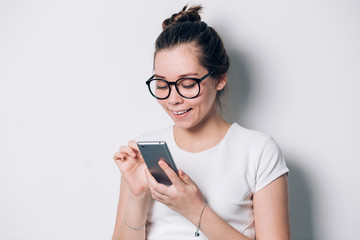 Fototapeta premium Image of young female using cellular phone