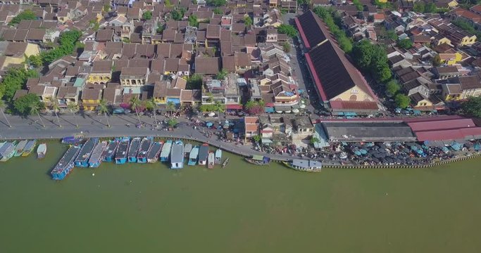 Panoramic of Hoian market. Aerial view of Hoi An old town or Hoian ancient town in sunny day. Royalty high-quality free stock video footage top view of Hoai river and boat traffic in Hoi An market