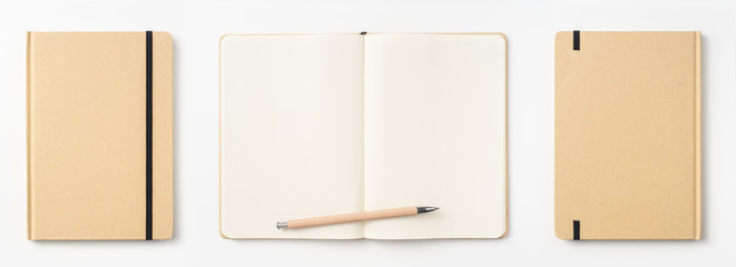 Top view of kraft paper notebook, page, pencil