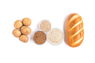 Carbohydrates of loaf, potatoes and groats isolated on white background..