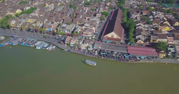Panorama of Hoian market. Aerial view of Hoi An old town or Hoian ancient town in sunny day. Royalty high-quality free stock video footage top view of Hoai river and boat traffic in Hoi An market