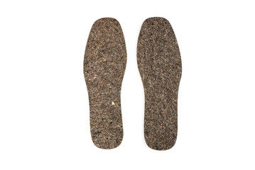 Warm shoe insoles isolated on white background.