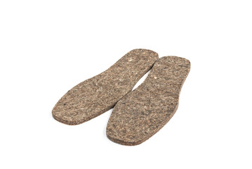 Warm shoe insoles isolated on white background.