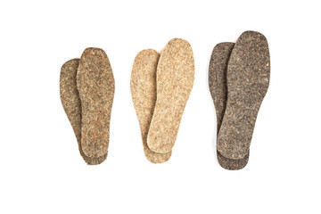 Warm shoe insoles isolated on white background.