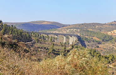 Fototapeta na wymiar bridge on the background of the hills