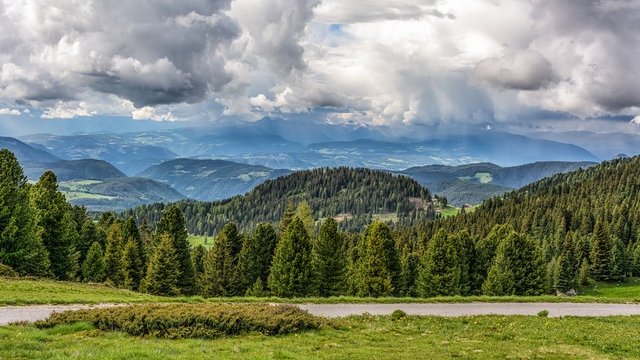 Dolomites Mountains, spring landscape in the The Ege Valley in South Tyrol, Alps, northern Italy, Europe. Ega valley in South Tyrol with its sunny location and very charming villages