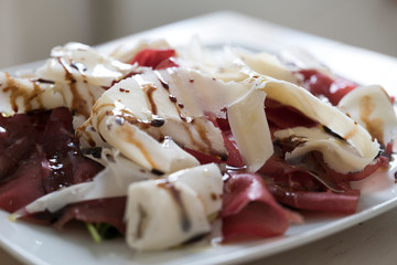 frontal bresaola dish