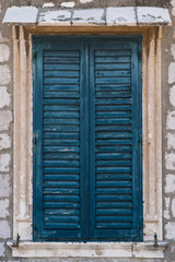 blue window shutters