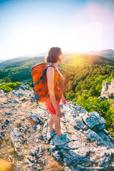 Girl at the top of the mountain.