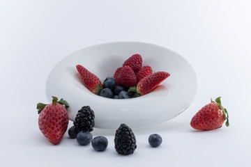Fresh berries on a white dish