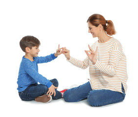 Hearing impaired mother and her child talking with help of sign language on white background