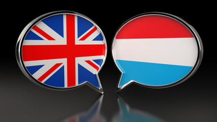 United Kingdom and Luxembourg flags with Speech Bubbles. 3D illustration