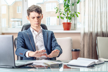 Naklejka premium Official businessman sitting at workplace in office refuses bribes. Concept of corruption and bribery
