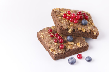 Brownie Pieces with Nuts Decorated With Fresh Berries Tasty Homemade Brownie Copy Space Horizontal