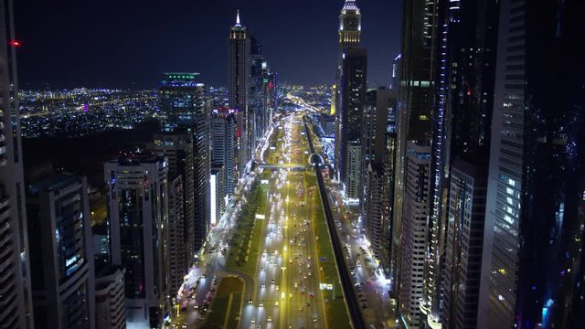 Aerial illuminated night view Sheikh Zayed road Dubai 
