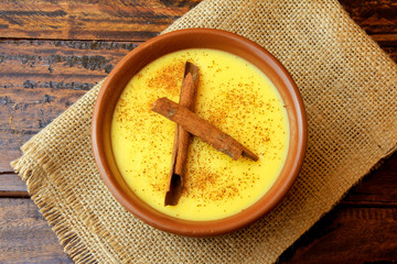 Curau, cream of corn sweet and dessert typical of the Brazilian cuisine, with cinnamon placed in...