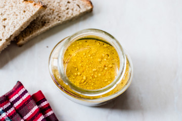 Jar of Peanut Butter with Bread Slices for Breakfast.