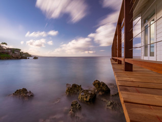 Lanscape of Ocean with Rocks and Pier - Long Exposure