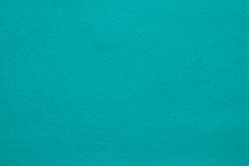 Felt texture pattern background in blue color