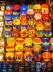Collection of Traditional glass bowls lamps on sale at Christmas market in Budapest, Istanbul, Moscow, London, Lisbon, Paris, Berlin, Madrid, Rome. Colorful glass,ceramic souvenirs.
