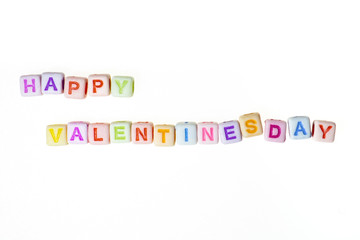 Happy Valentine's Day - Valentinstag - bunter Text auf kleinen Würfeln